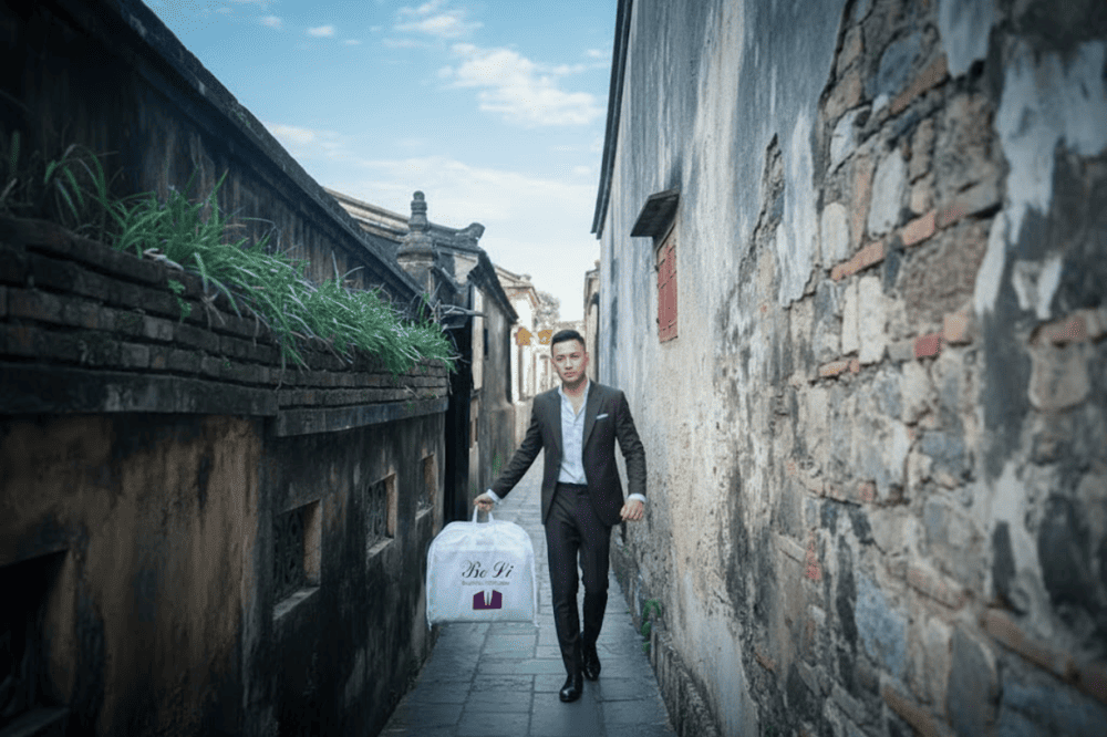 Customer with outfit from Be Li Tailor